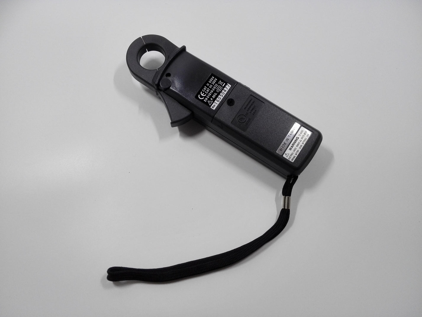 Back of PROVA CM-07 clamp meter with CAT III 300V and CAT II 600V markings