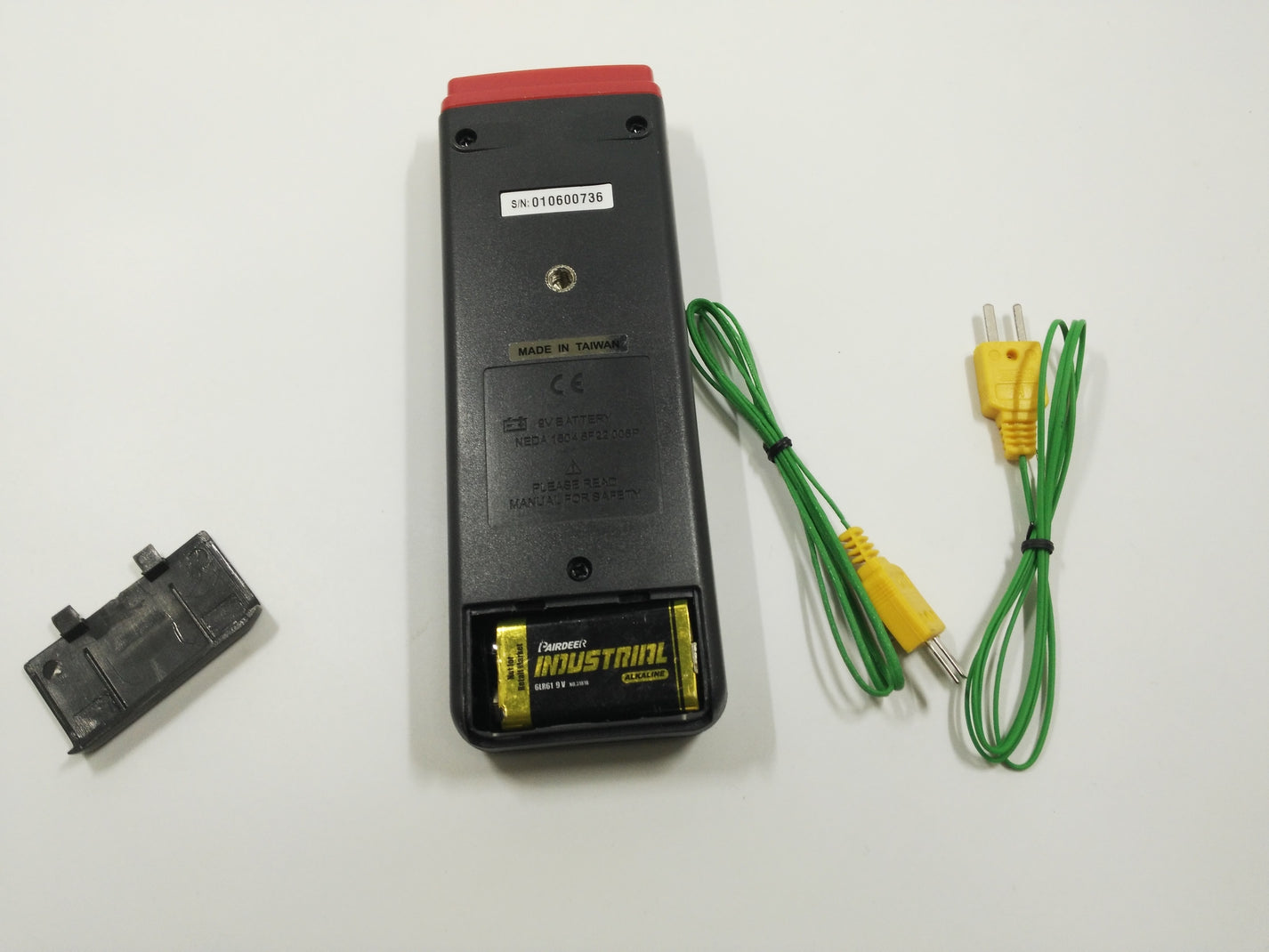 Back view of CENTER 301 thermometer with 9V battery and Type K probe leads
