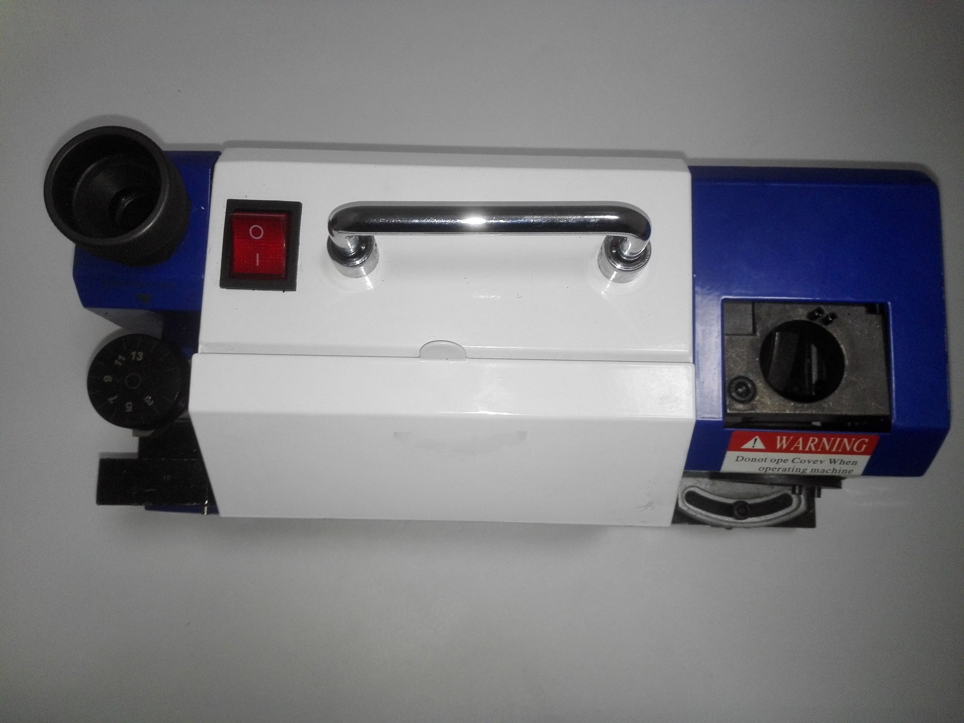 Top view of ER20 drill bit grinder with setup dial and switch