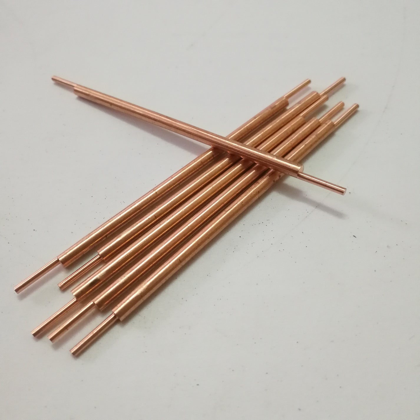 Alumina copper electrode pins for battery spot welder holders