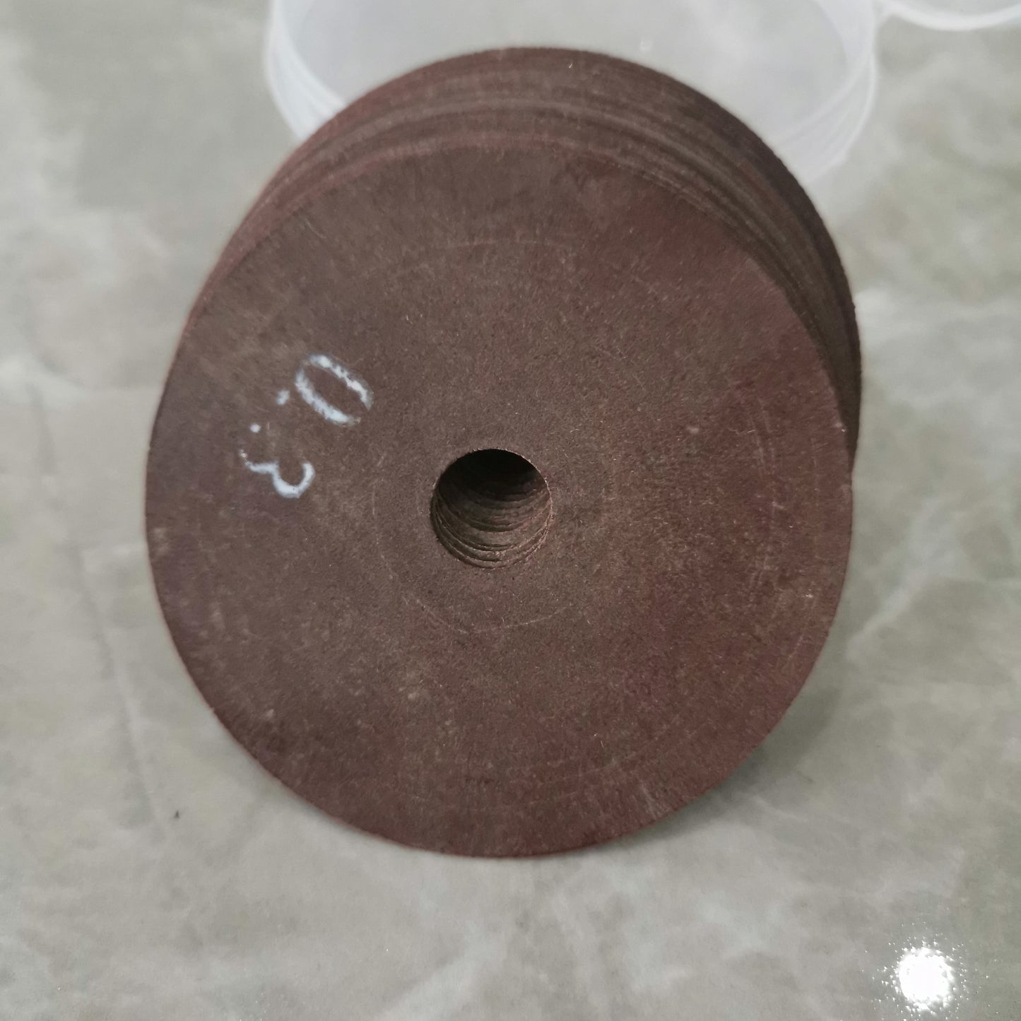 Close view of 0.3mm nick grinder cutting disc for steel rule die work