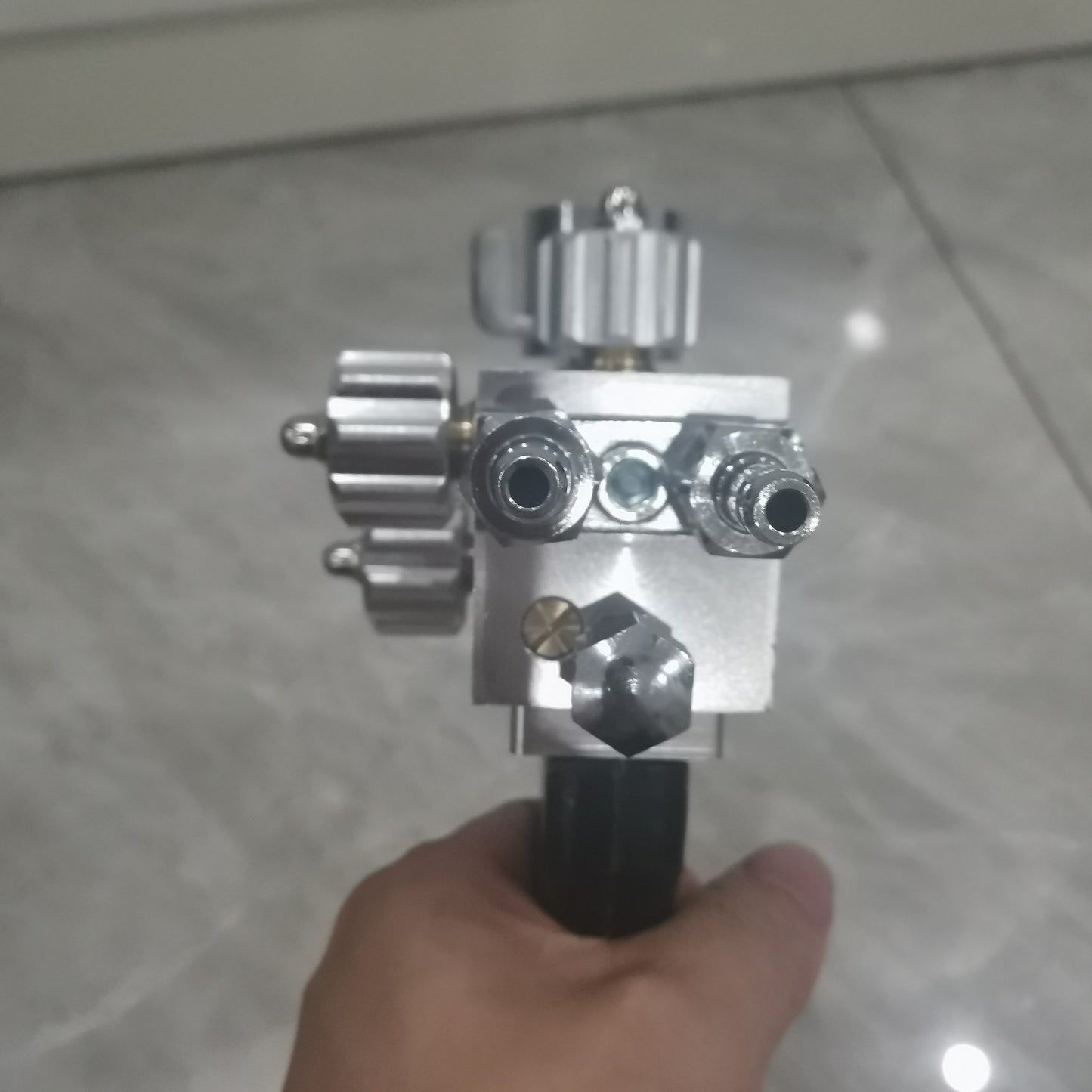 Thermo spray welding torch rear gas connector and control knob detail
