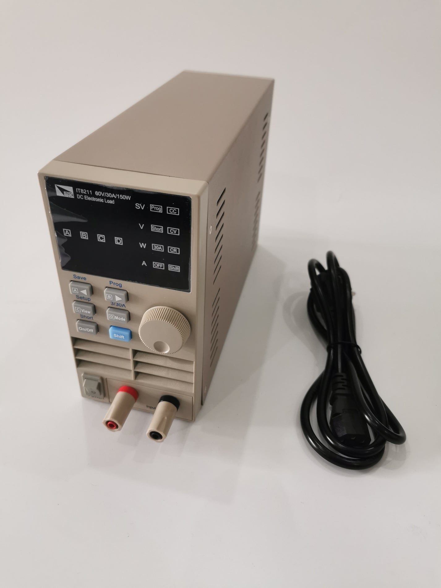 ITECH IT8211 DC electronic load with power cord shown beside the unit