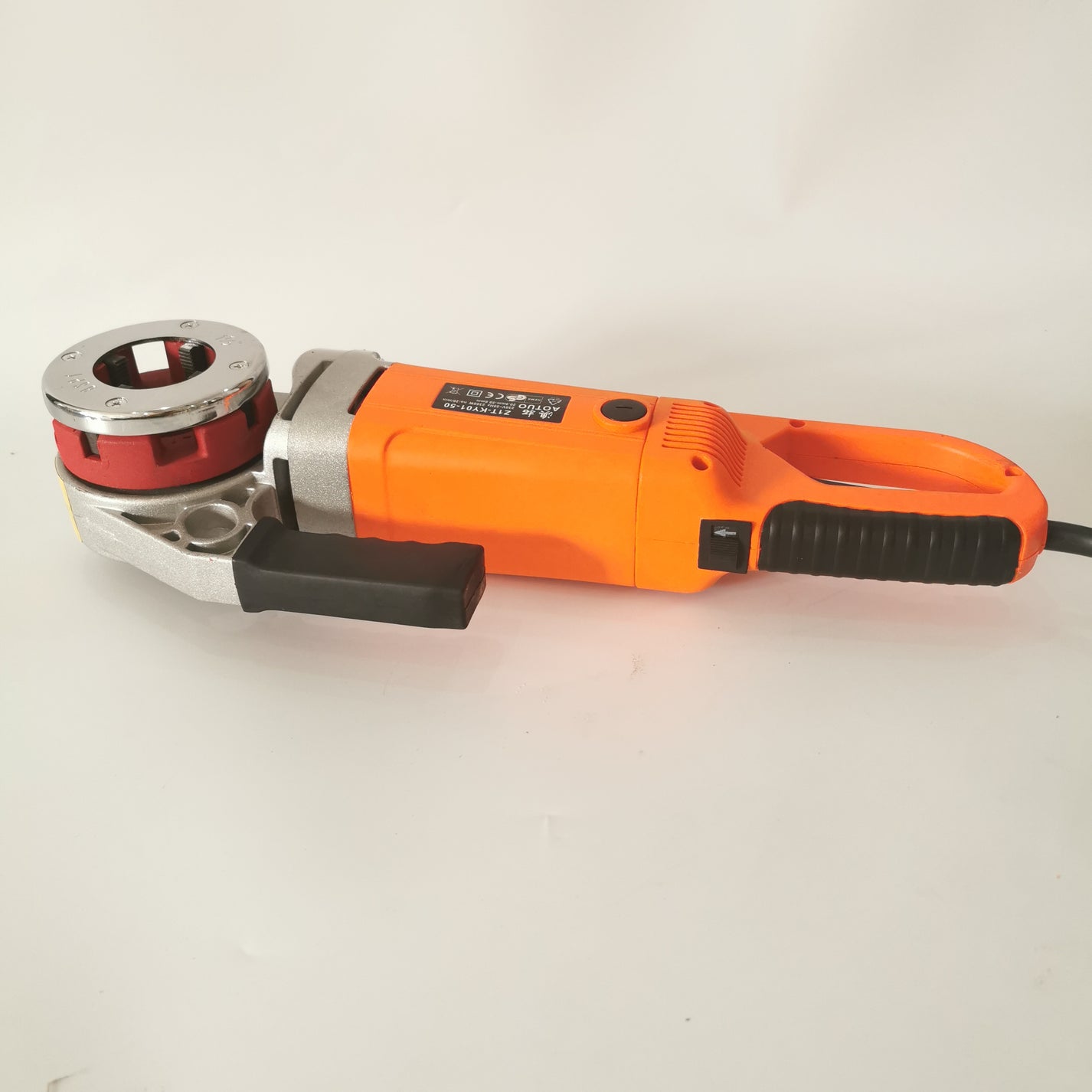 Portable pipe threading machine with forward reverse switch and power cord