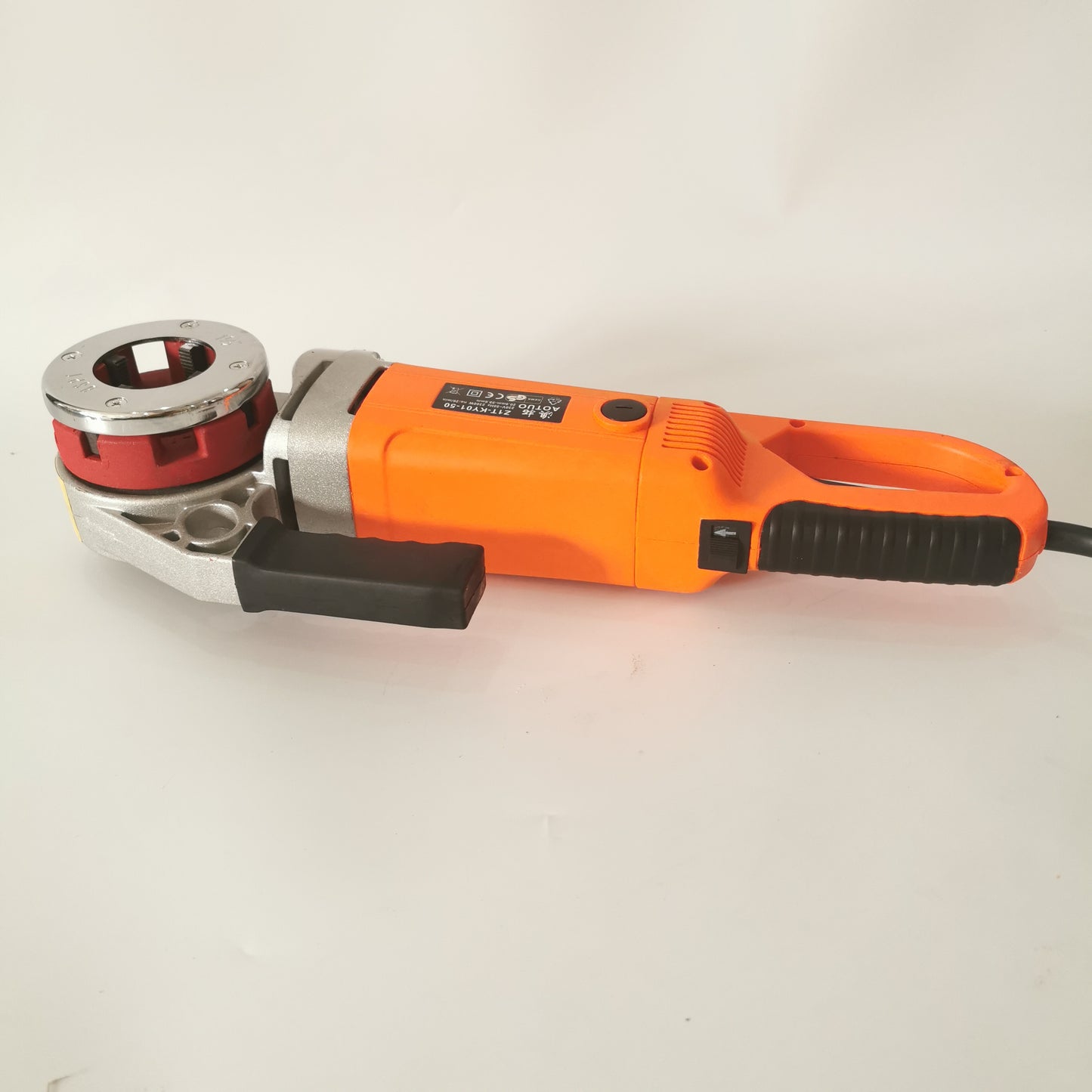 Portable pipe threading machine with forward reverse switch and power cord