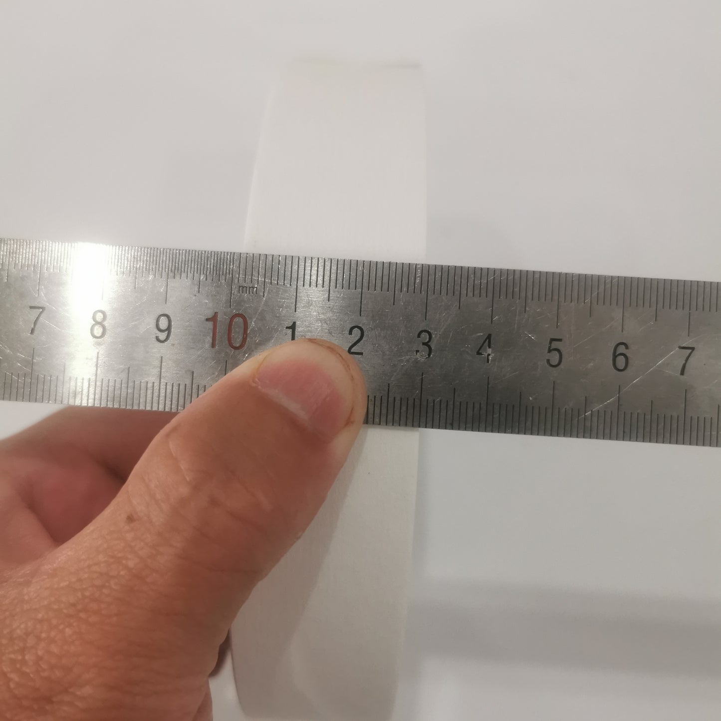 Cash strapping paper tape roll for banknote bundling applications