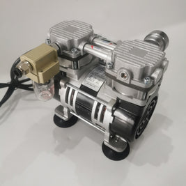 Angled view of oil-free silent lab vacuum pump showing intake and exhaust labels