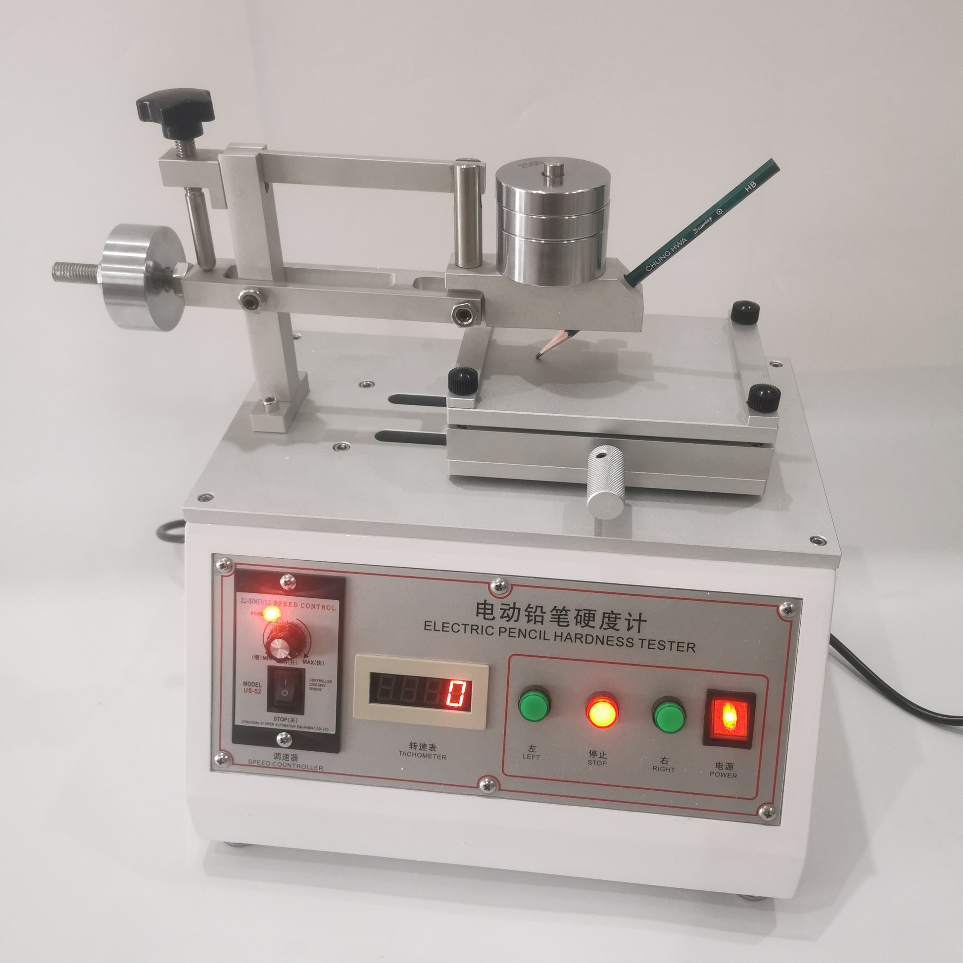Electric pencil hardness tester showing 45 degree pencil holder and sample platform