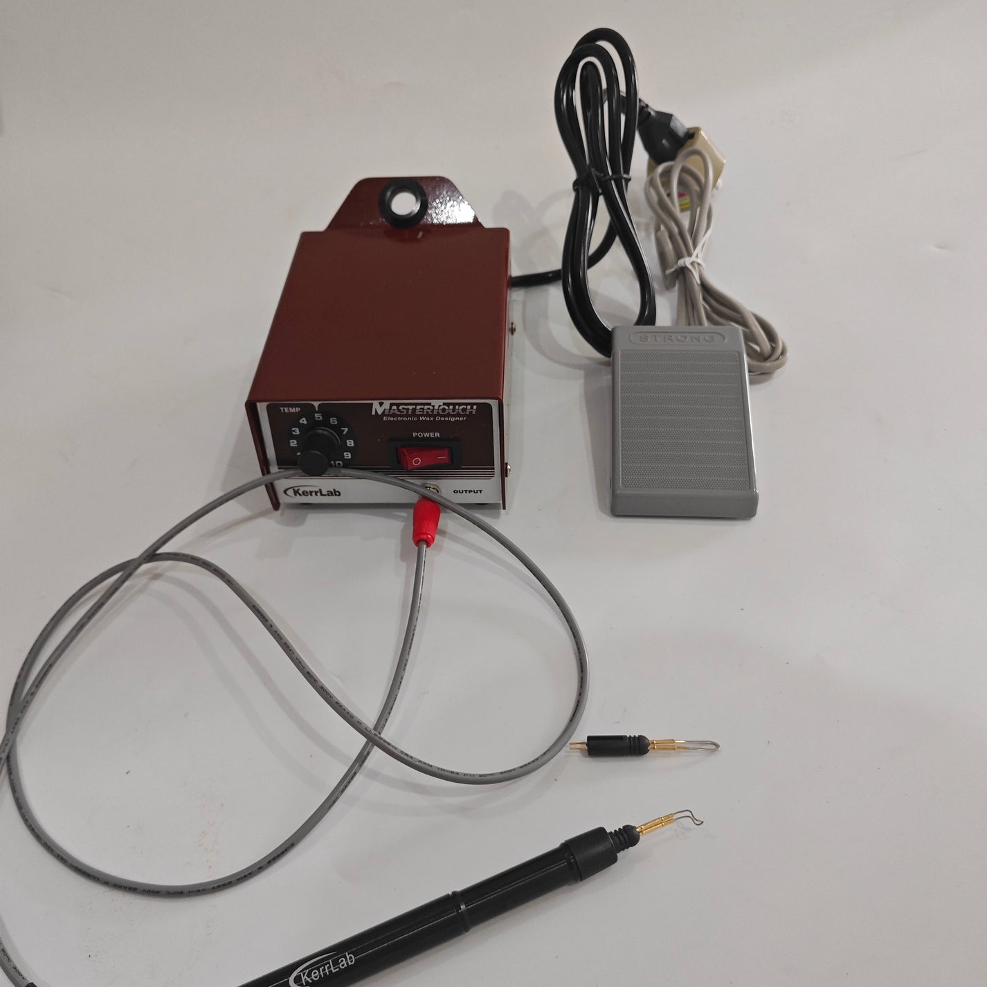 MasterTouch wax designer control unit connected to handpiece and foot pedal