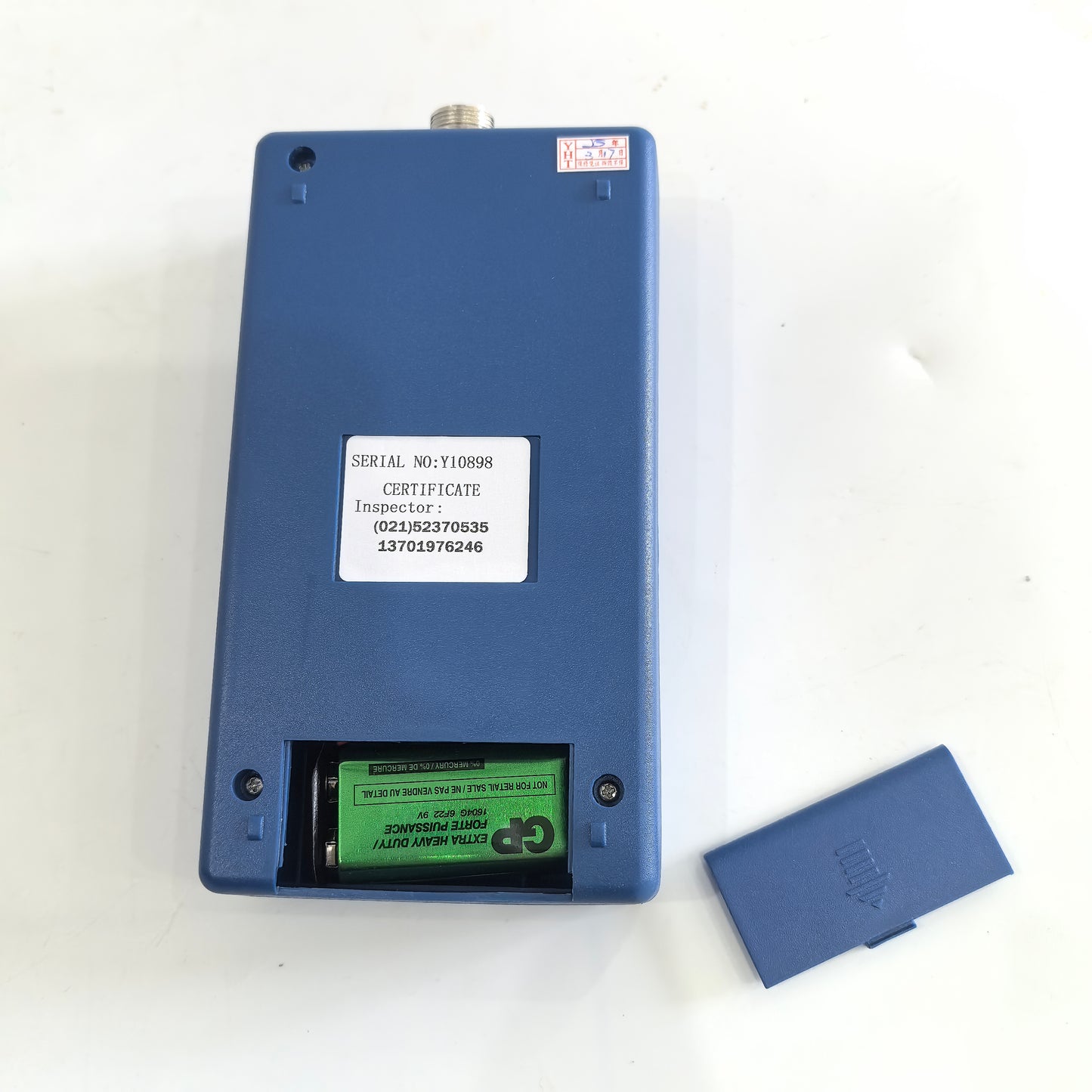 Back of HT201 gaussmeter showing 9V battery compartment and serial label