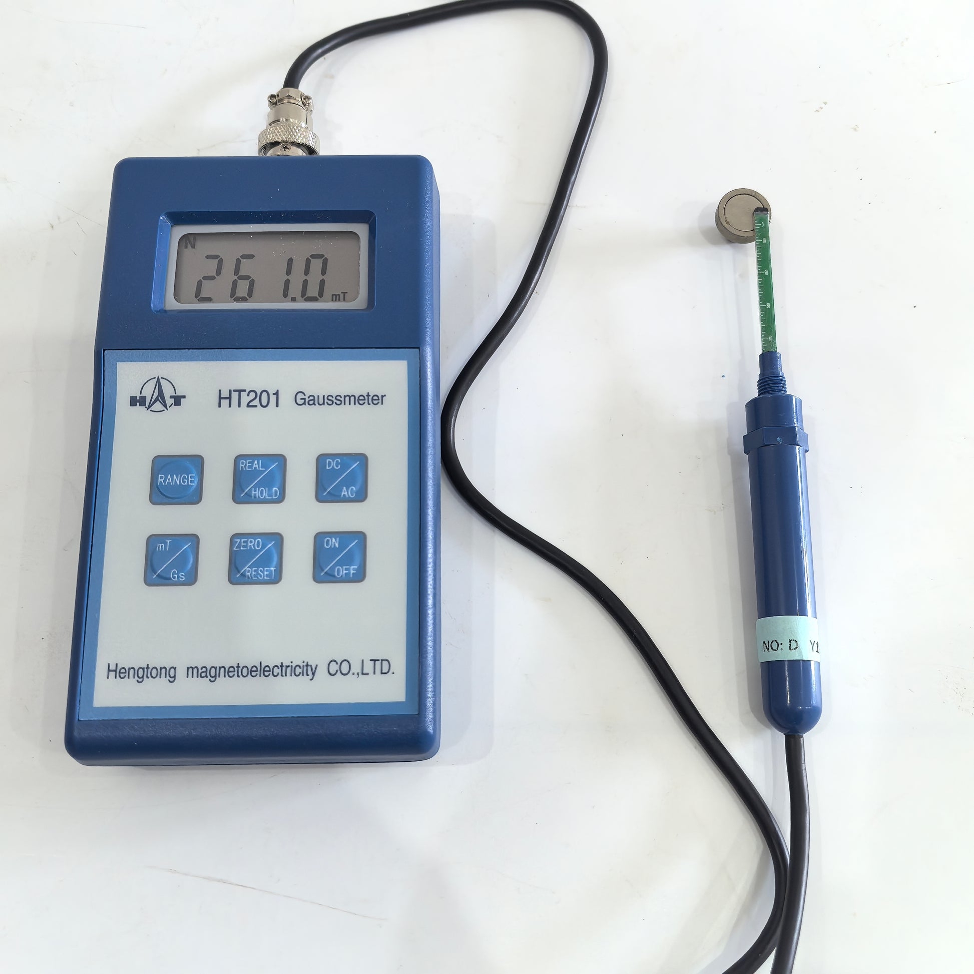 HT201 gauss tesla meter displaying mT reading with external probe