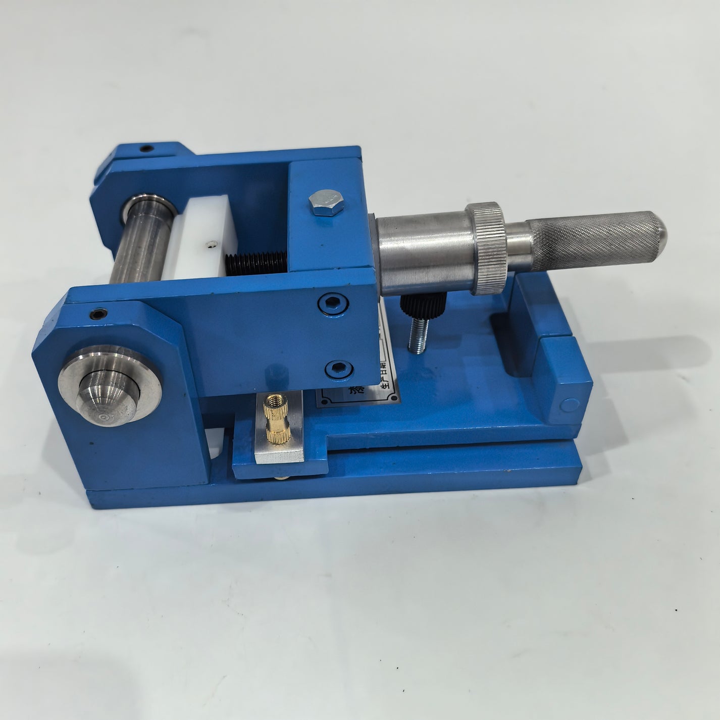 QTY-32 tester clamping area and mandrel roller close-up