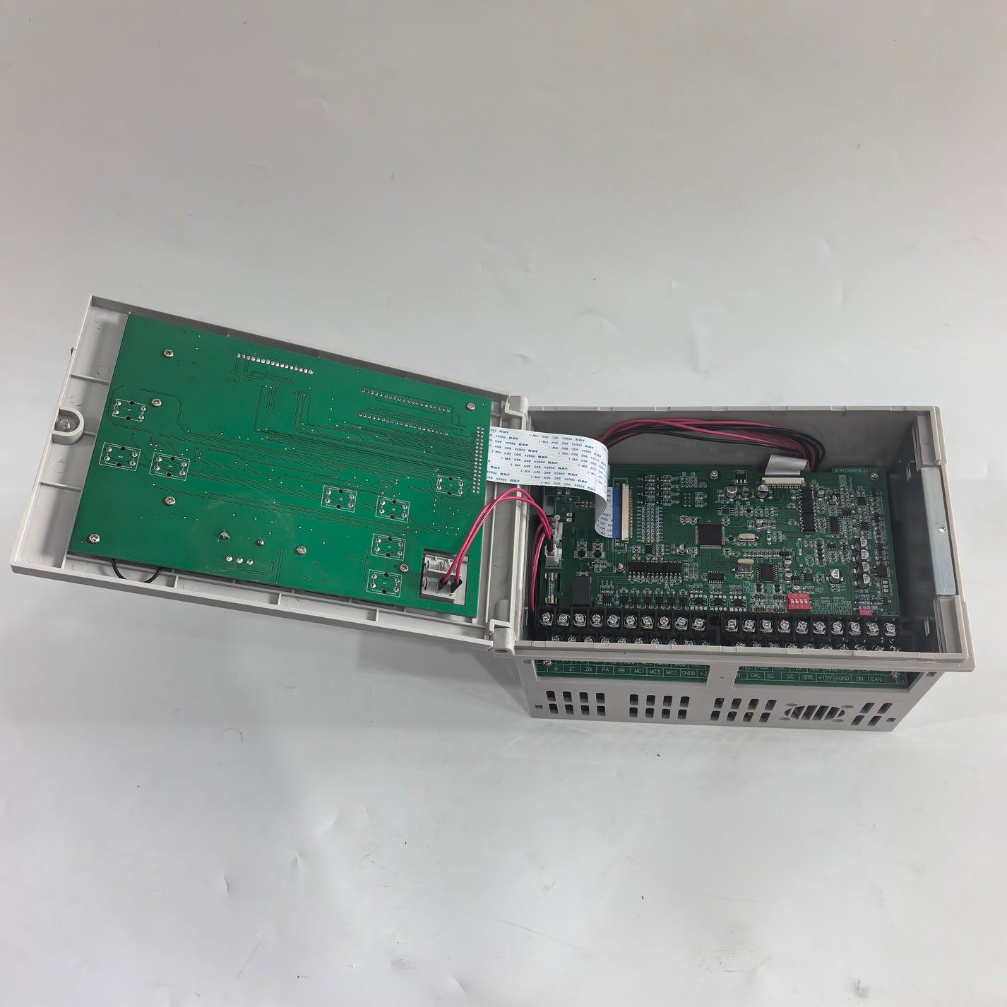 Open FMF KTC828A web tension controller showing internal circuit boards, wiring, and terminal blocks