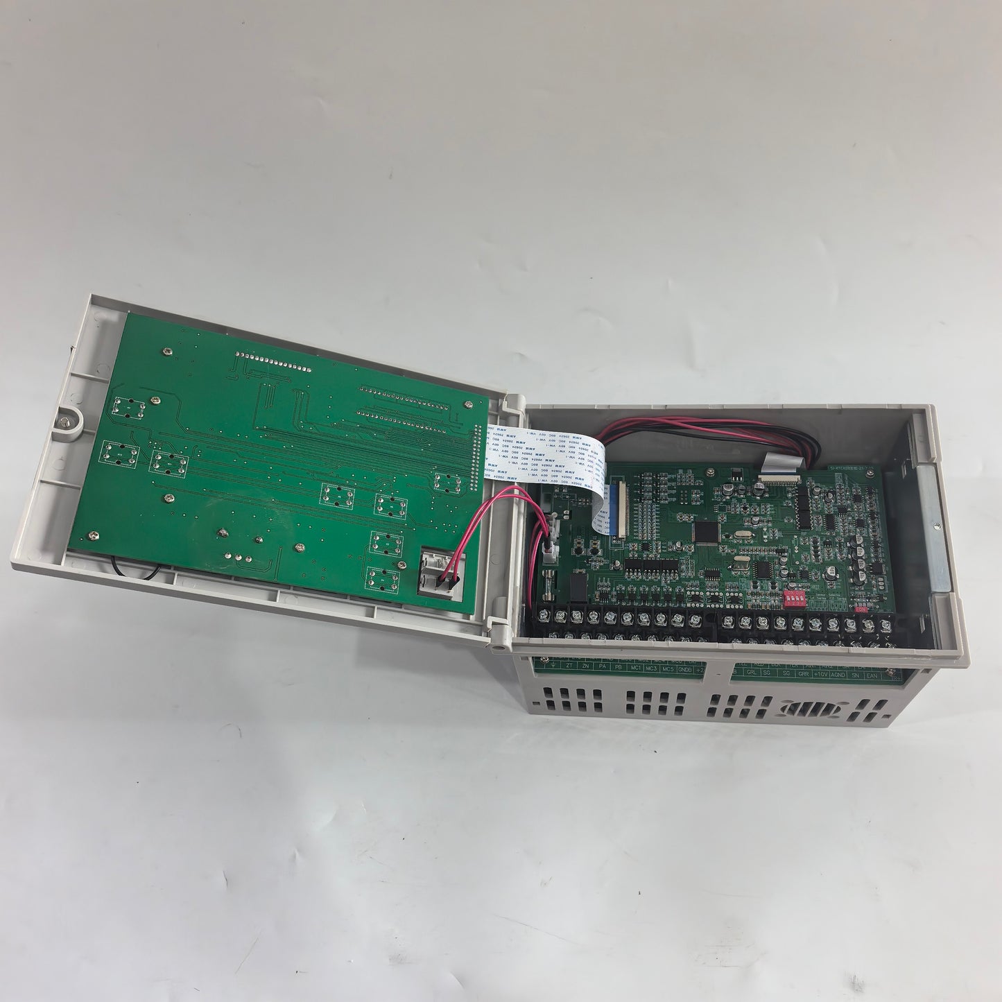 Open FMF KTC828A web tension controller showing internal circuit boards, wiring, and terminal blocks