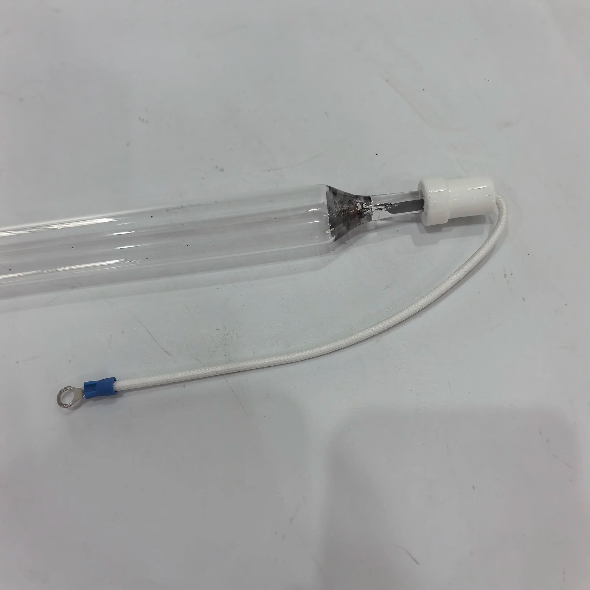 UV curing lamp end terminal detail with white connector lead