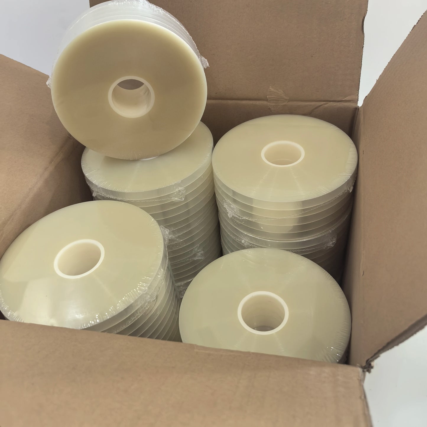 Carton of transparent OPP banding tape rolls for 100-roll pack