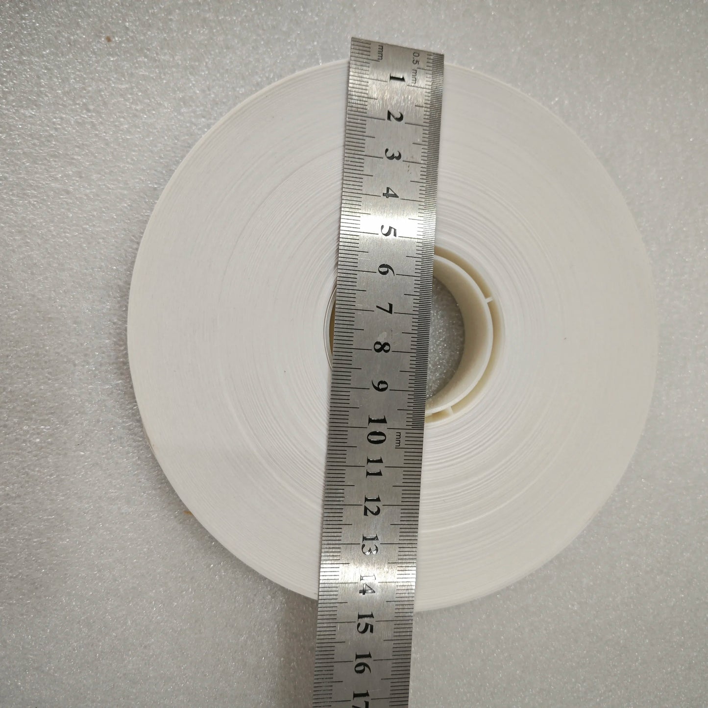 15cm outer diameter paper banding tape roll measured with ruler