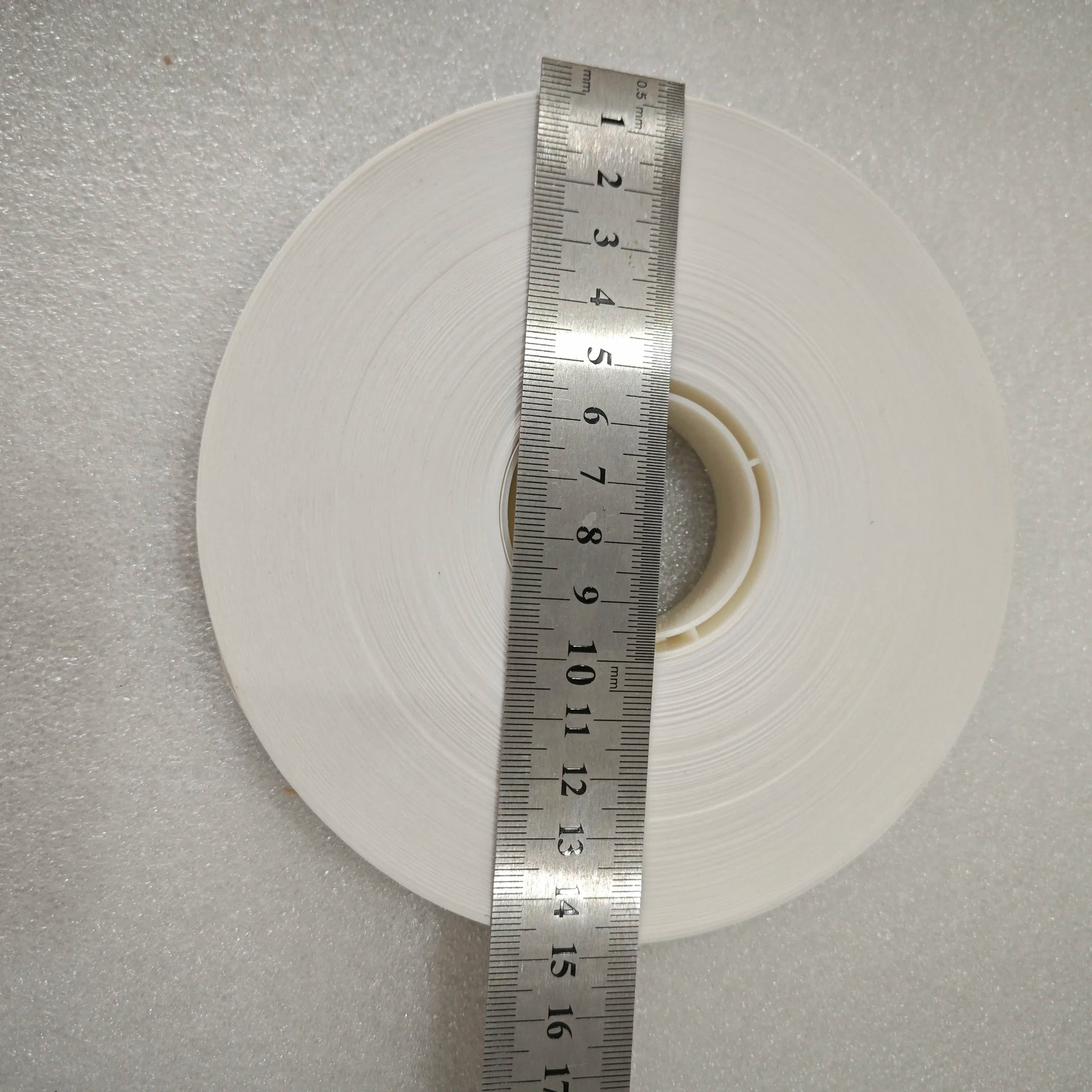 15cm outer diameter paper banding tape roll measured with ruler