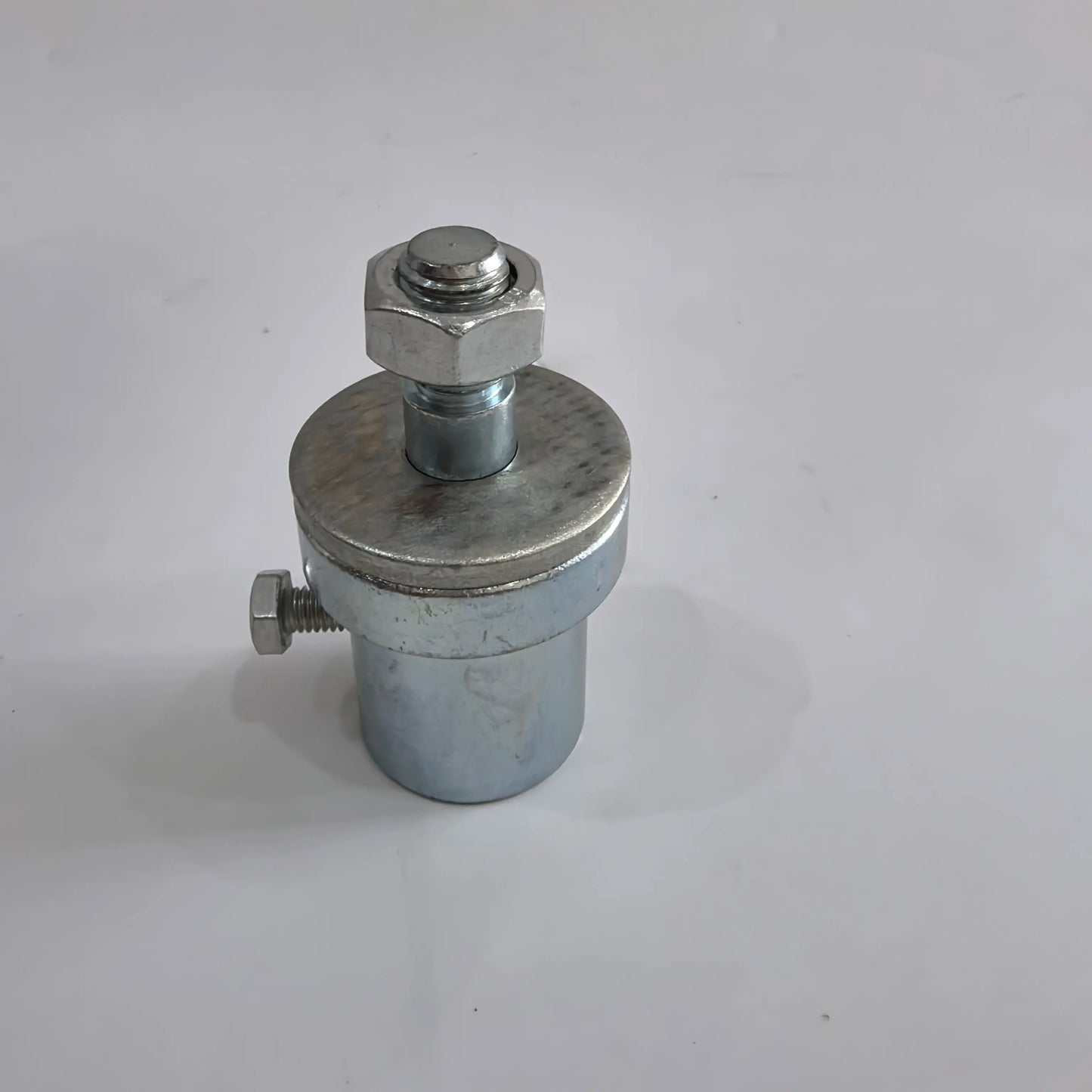 Angled view of 14mm lapidary motor shaft adapter and M6 locking screw