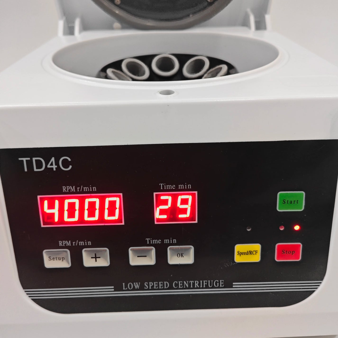 TD4C centrifuge control panel showing 4000 RPM and 29 minute timer display