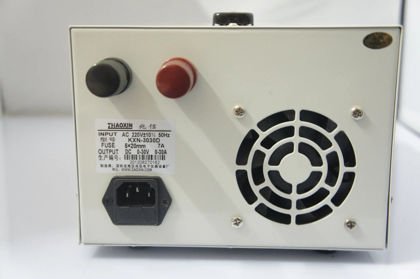 KXN-3030D rear panel label showing AC 220V input and DC 0-30V 0-30A output