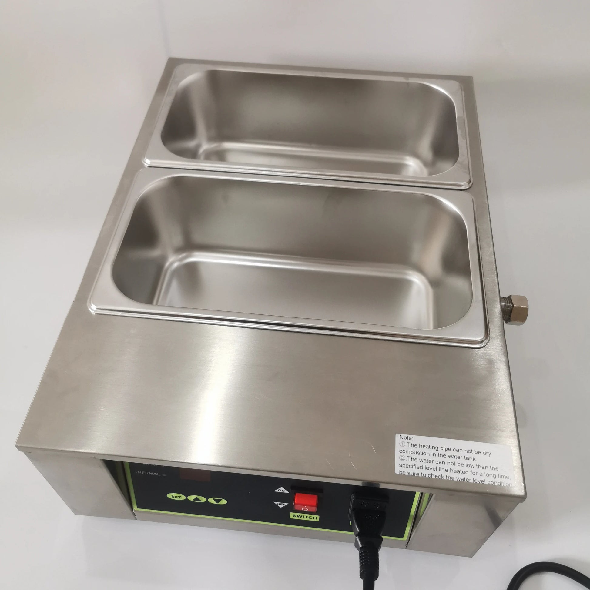 Front view of 2-tank chocolate melting machine with control panel