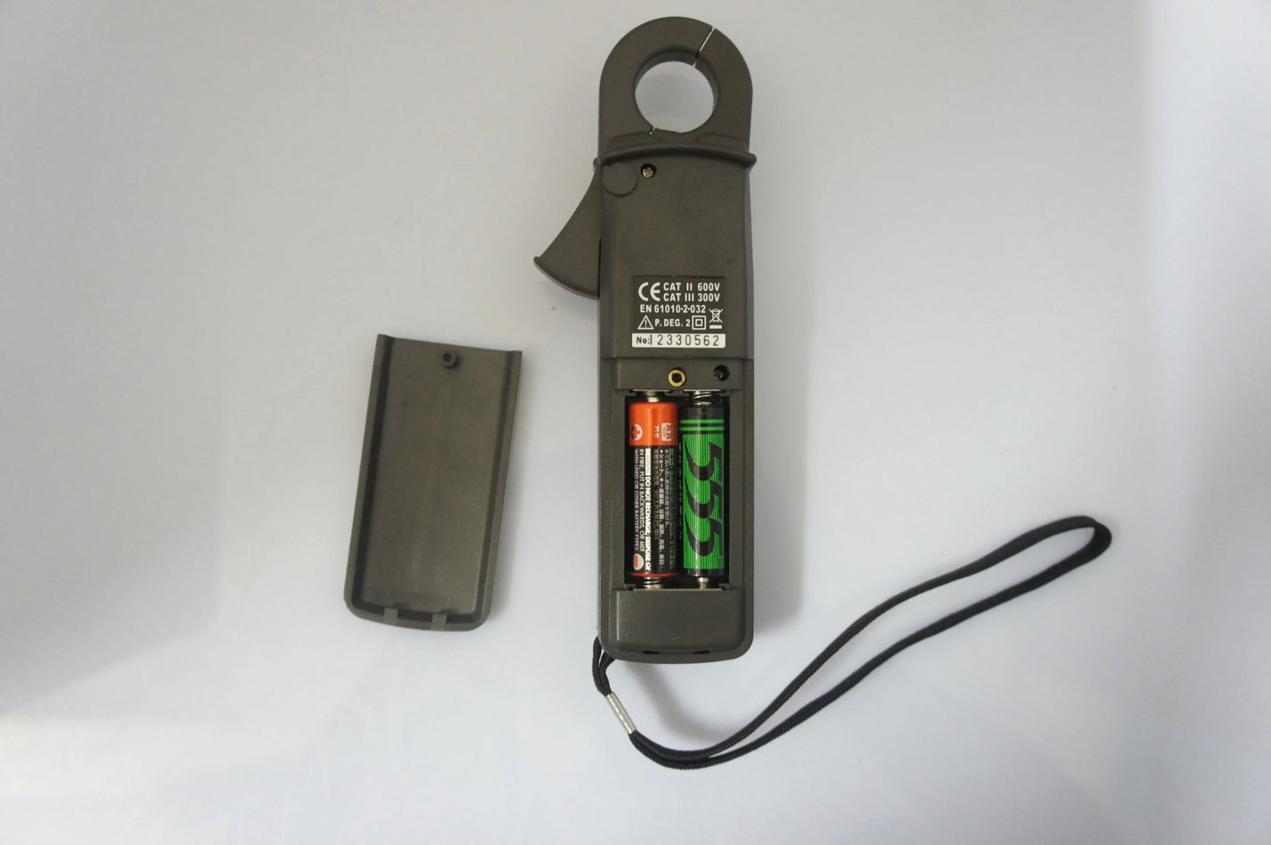 PROVA-11 clamp meter rear label and AA battery compartment
