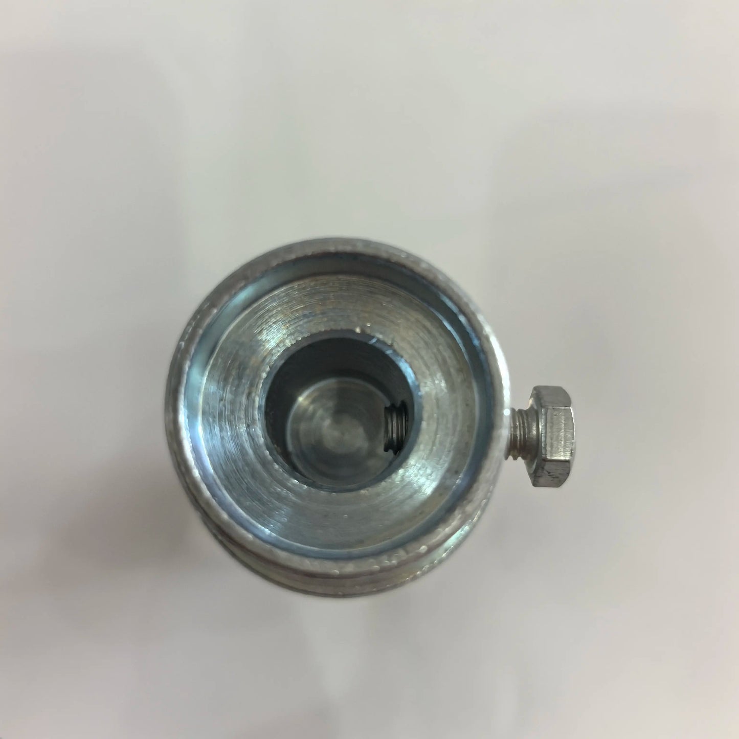 Close-up of 14mm bore and side locking screw on lapidary shaft adapter
