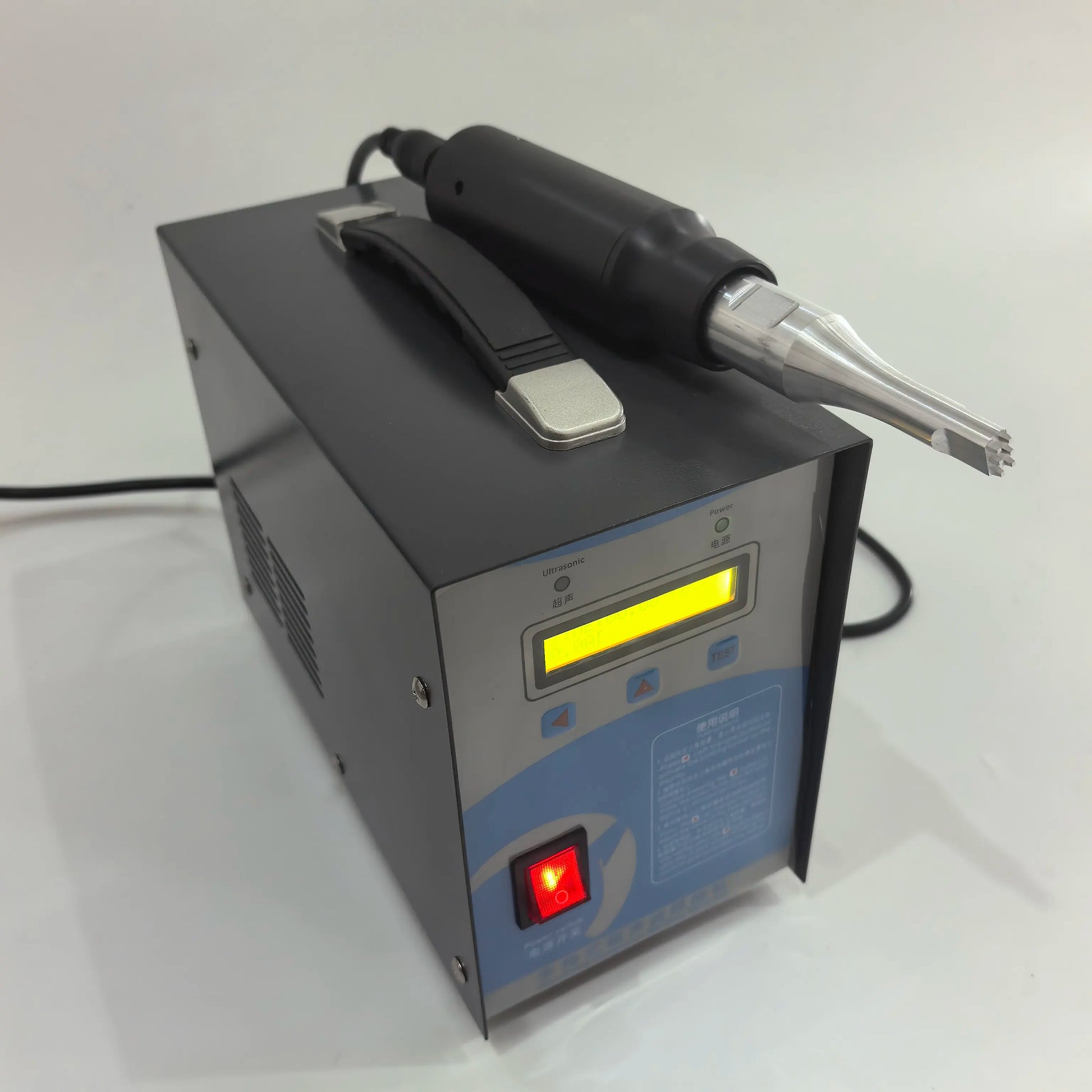 1500W ultrasonic spot welder top view with handheld welding gun and horn