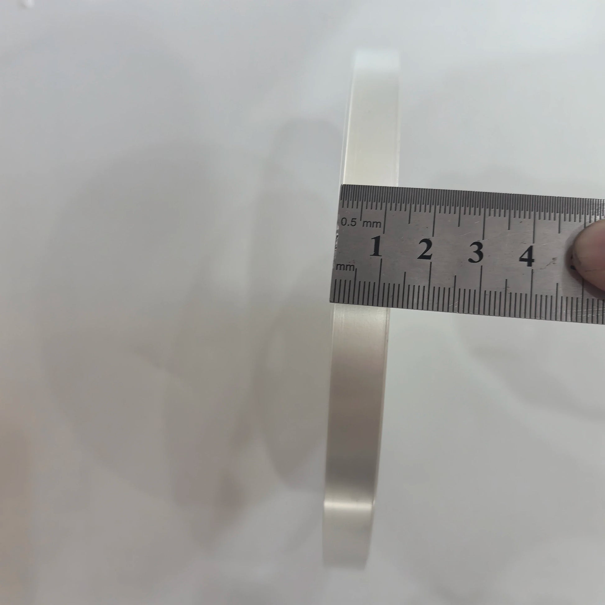 Ruler detail showing 11mm transparent OPP strapping tape width