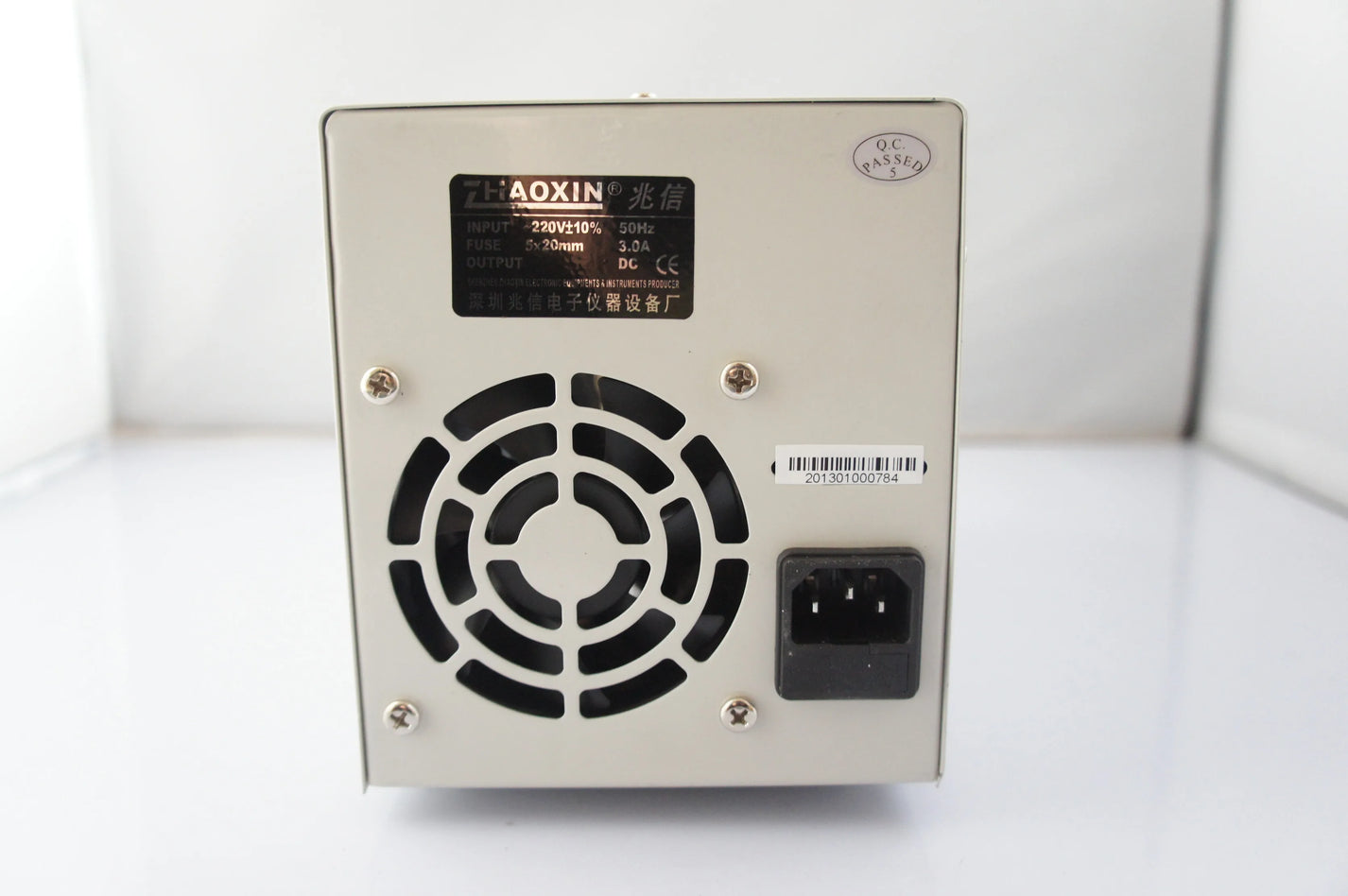 ZHAOXIN RXN-605D rear panel with cooling fan AC inlet and 220V input label