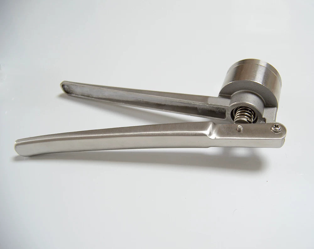 Side view of FMF hand-operated vial cap crimper