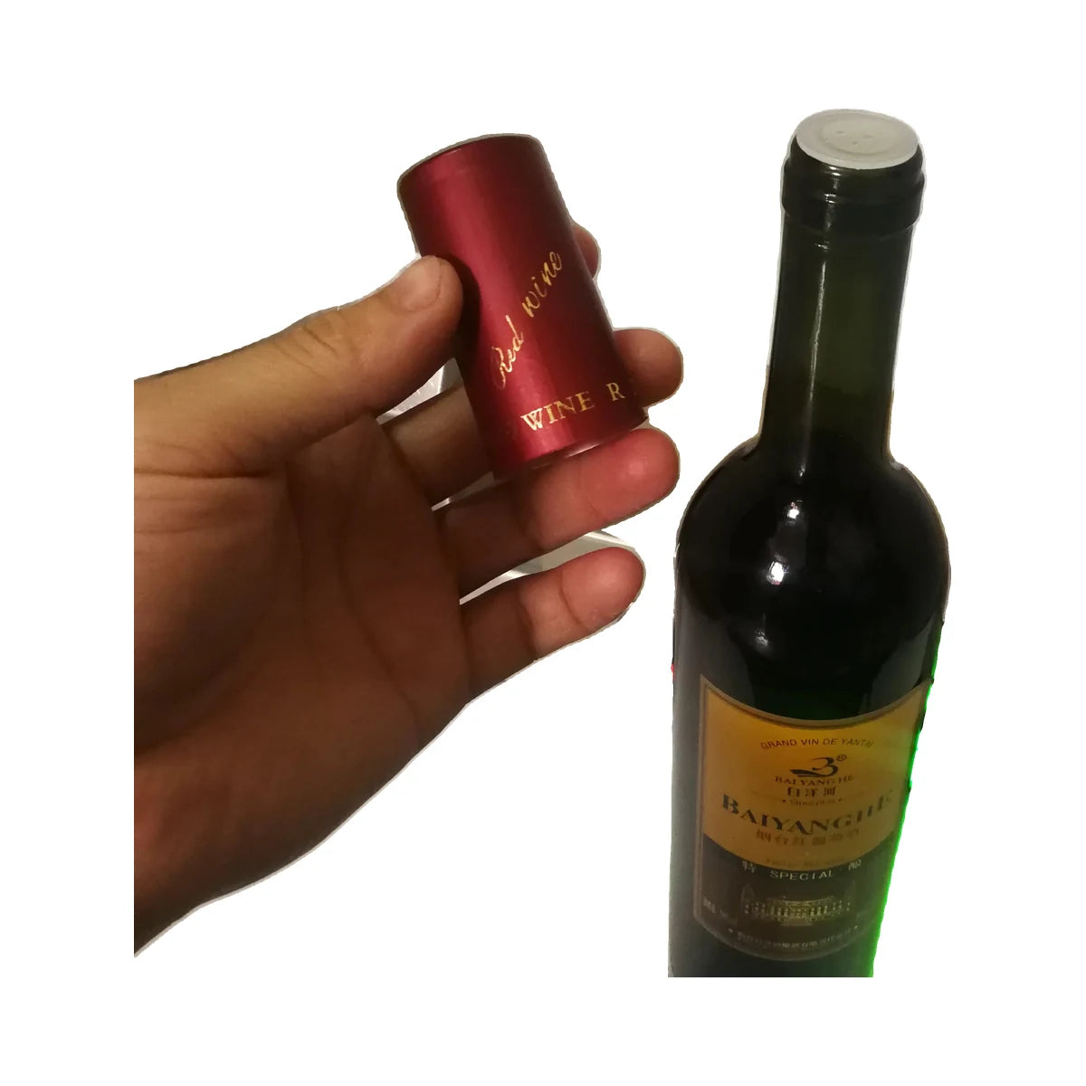 PVC heat shrink bottle cap sleeve shown with wine bottle neck