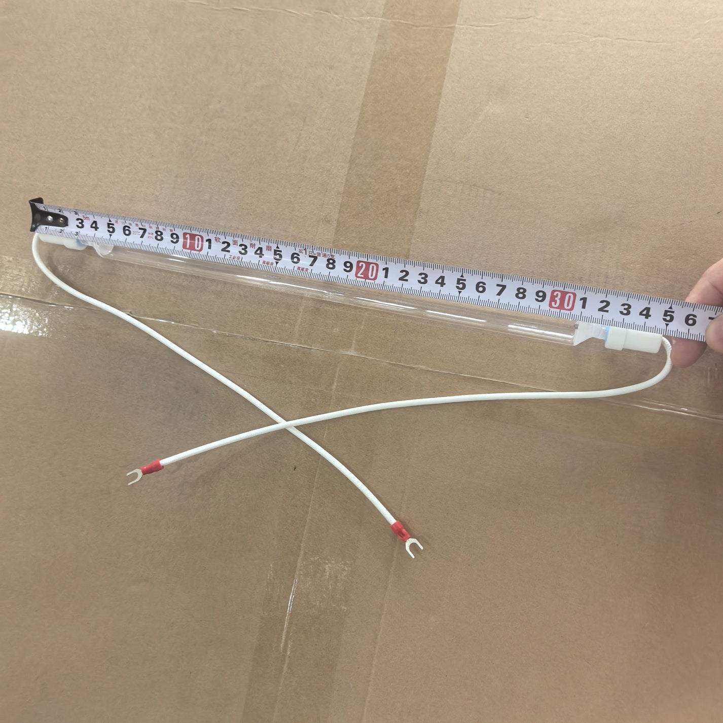 350 mm UV lamp measured with tape for overall length reference