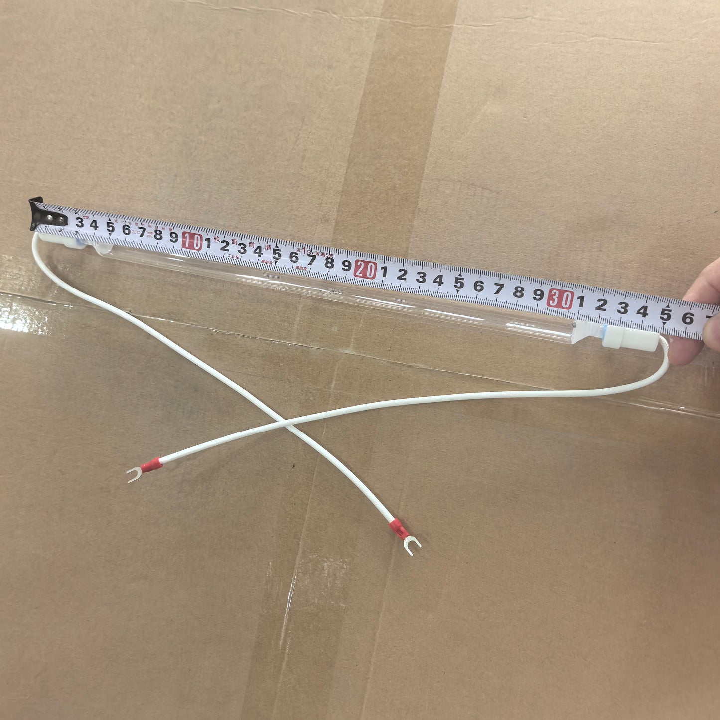 350 mm UV lamp measured with tape for overall length reference